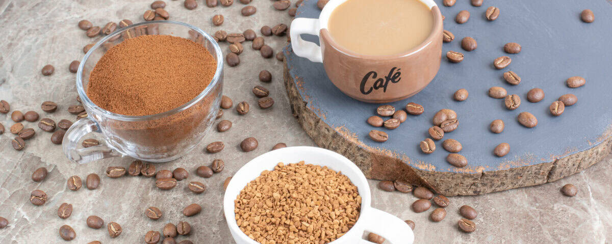 Three cups show coffee beans, instant coffee, and a mug—perfect for drinking coffee and enjoying its health benefits. | Emping SG
